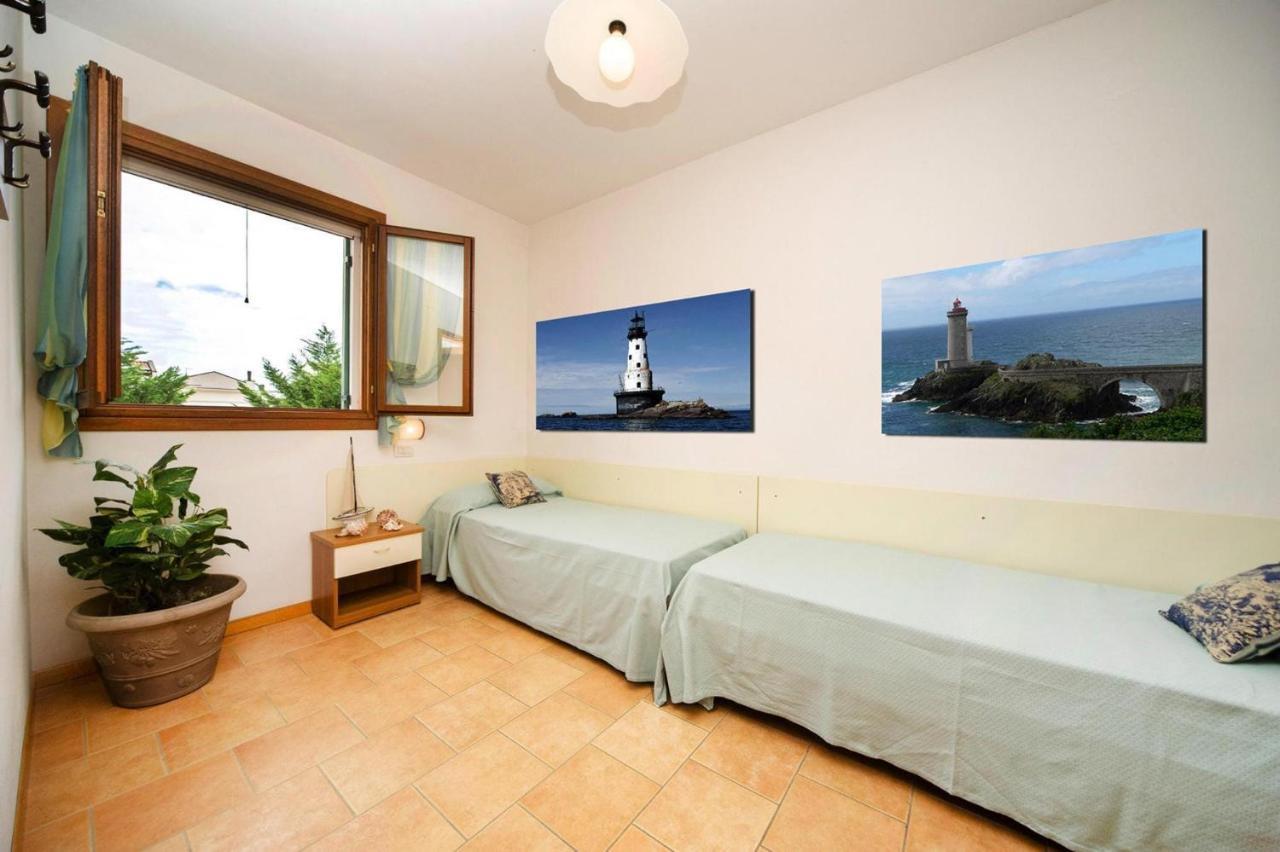 Terraced House In The Ca' Del Pino Holiday Complex With Communal Pool In บิบิโอเน ภายนอก รูปภาพ